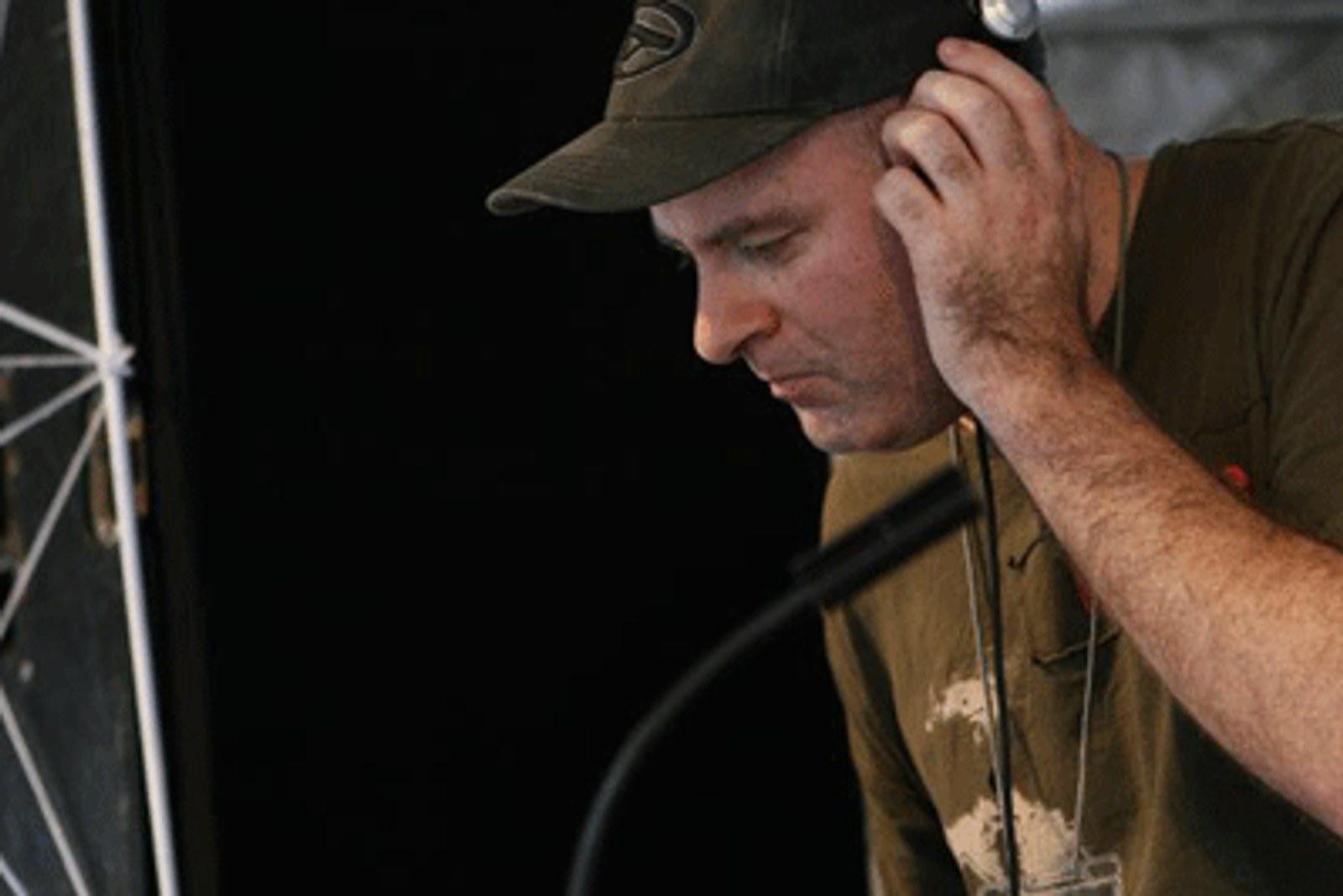 Fungus Funk performing at a DJ setup.