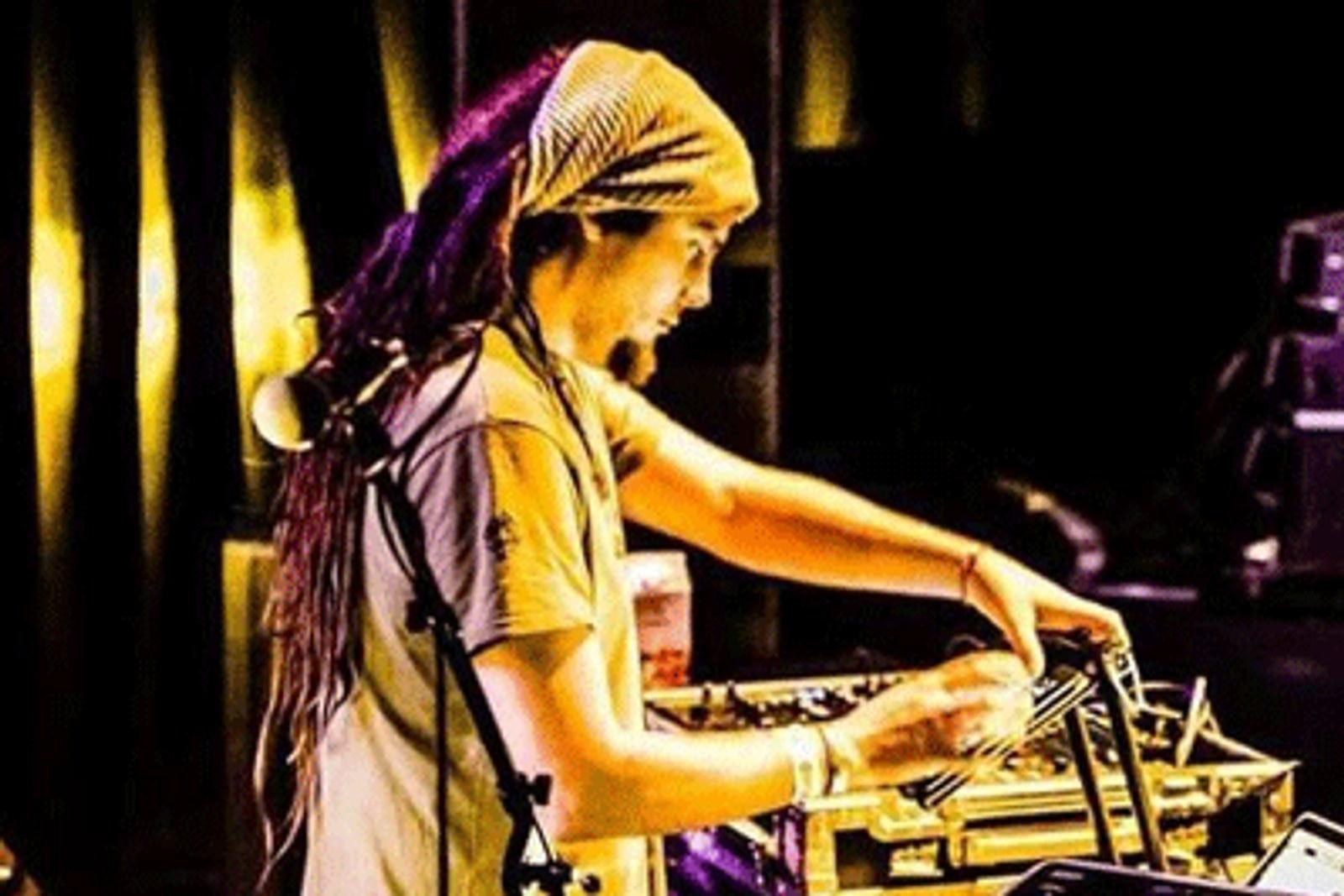 Highko performing at a DJ setup in the image assigned by Blast Records.