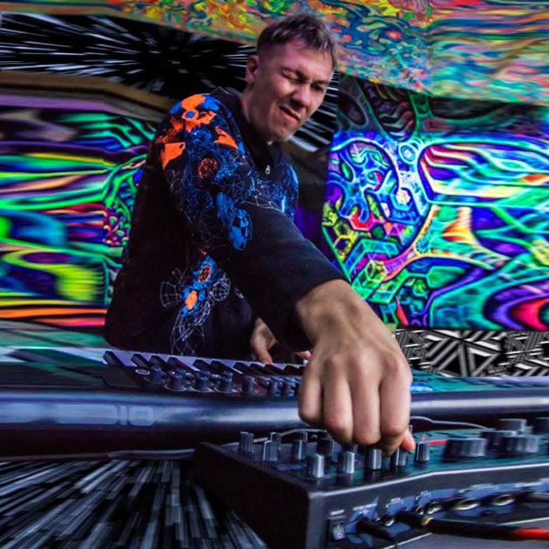 Alexey Kovalev performing as Transdriver at a psychedelic electronic-music event.
